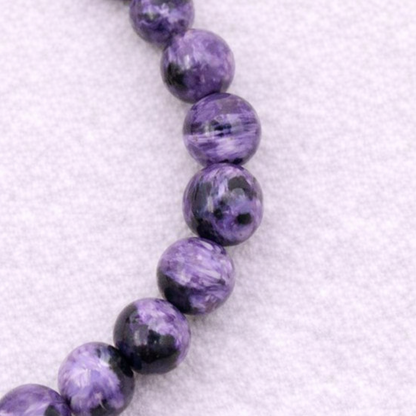 Bracelet perle en Charoïte, qualité AA, pierre de transformation et d'élévation spirituelle.