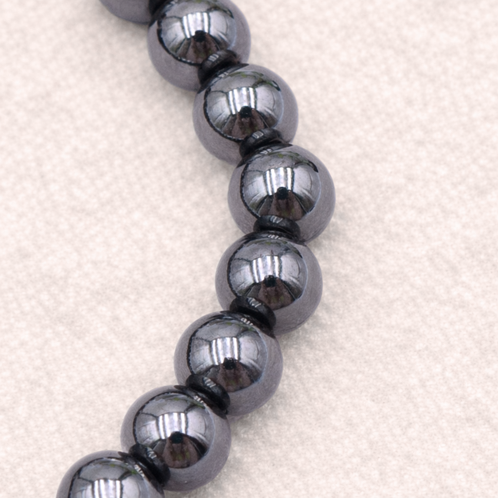 Bracelet perle en Hématite, qualité A, pierre de l'ancrage et de la protection.