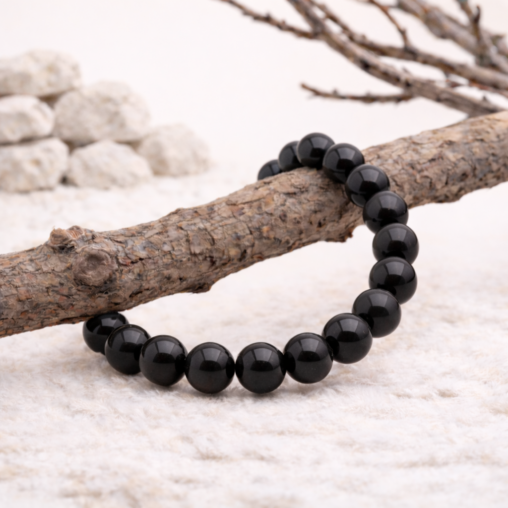Bracelet perle en Obsidienne noire, qualité A, pierre de protection et d'ancrage profond.