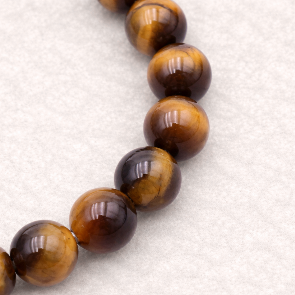 Bracelet perle en Oeil de tigre, qualité AA pierre de protection et de confiance en soi.