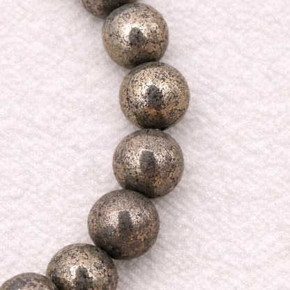 Bracelet perle en Pyrite, qualité A, pierre de protection et de prospérité.